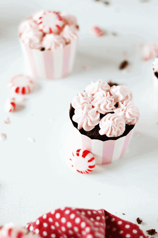 Pink Peppermint Buttercream Frosting | homemade frosting recipes, peppermint recide ideas, peppermint dessert recipes. peppermint frosting recipes, holiday frosting recipes || The Butter Half via @thebutterhalf #peppermint #frostingrecipe #holidaydesserts 