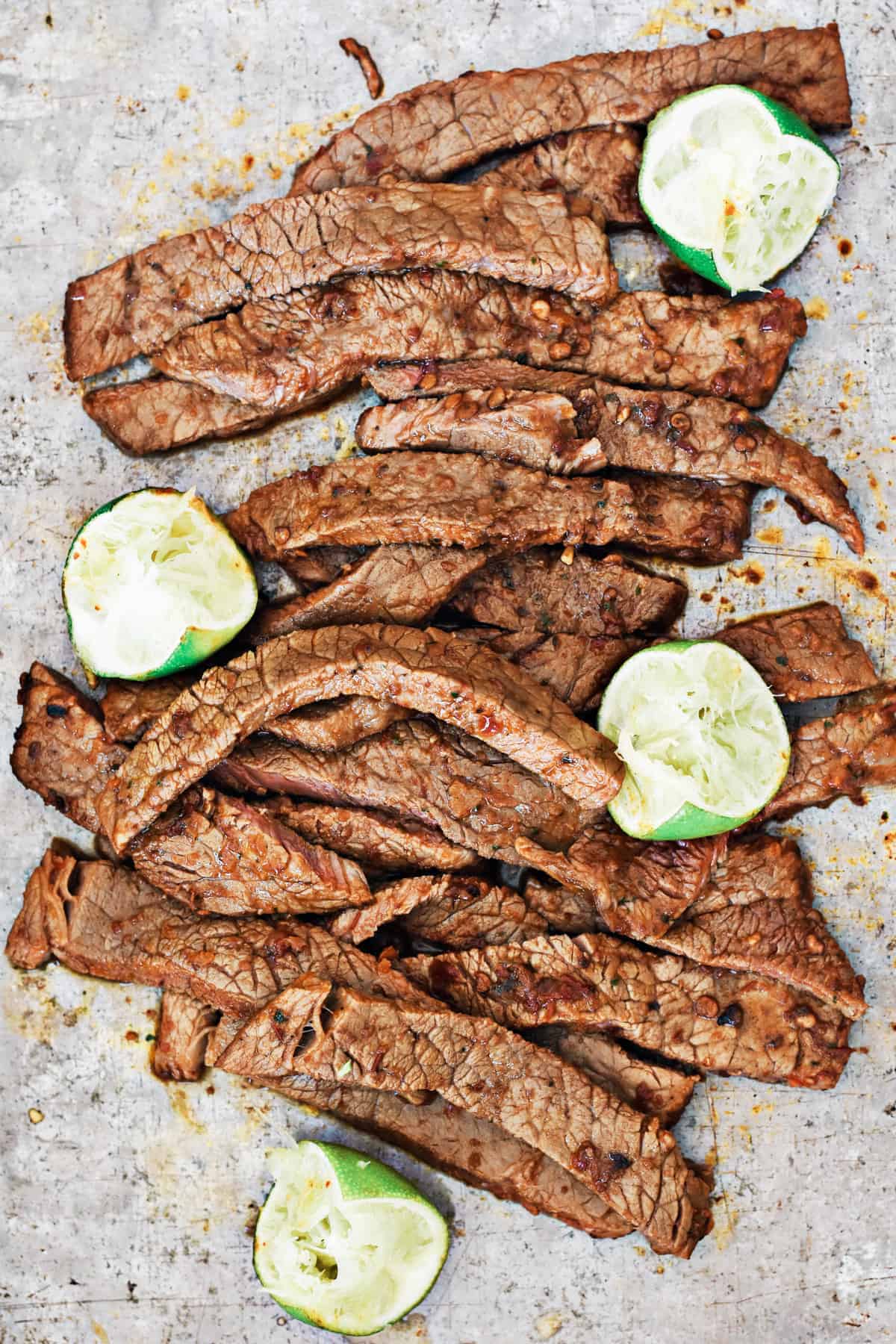 This grilled chipotle lime steak fajita salad is made in 30 minutes (after a savory marinade time) and is a filling and nutritious meal to serve for dinner. It can also be made ahead for a meal prep lunch salad, and is full of delicious flavor. || The Butter Half #salad #lunch #easyrecipe #chipotle #thebutterhalf
