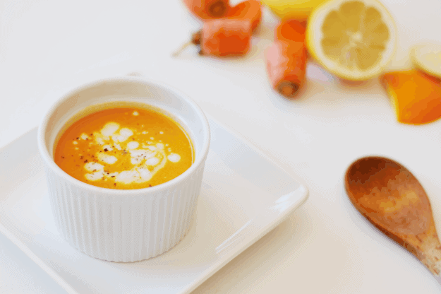 Creamy Carrot Soup with Ginger + Coconut Milk (Vegan) | vegan soup recipes, carrot soup recipe, homemade soup recipes, easy soup recipes, fall soup recipes, recipes using fresh carrots, fresh carrot soup || The Butter Half via @thebutterhalf