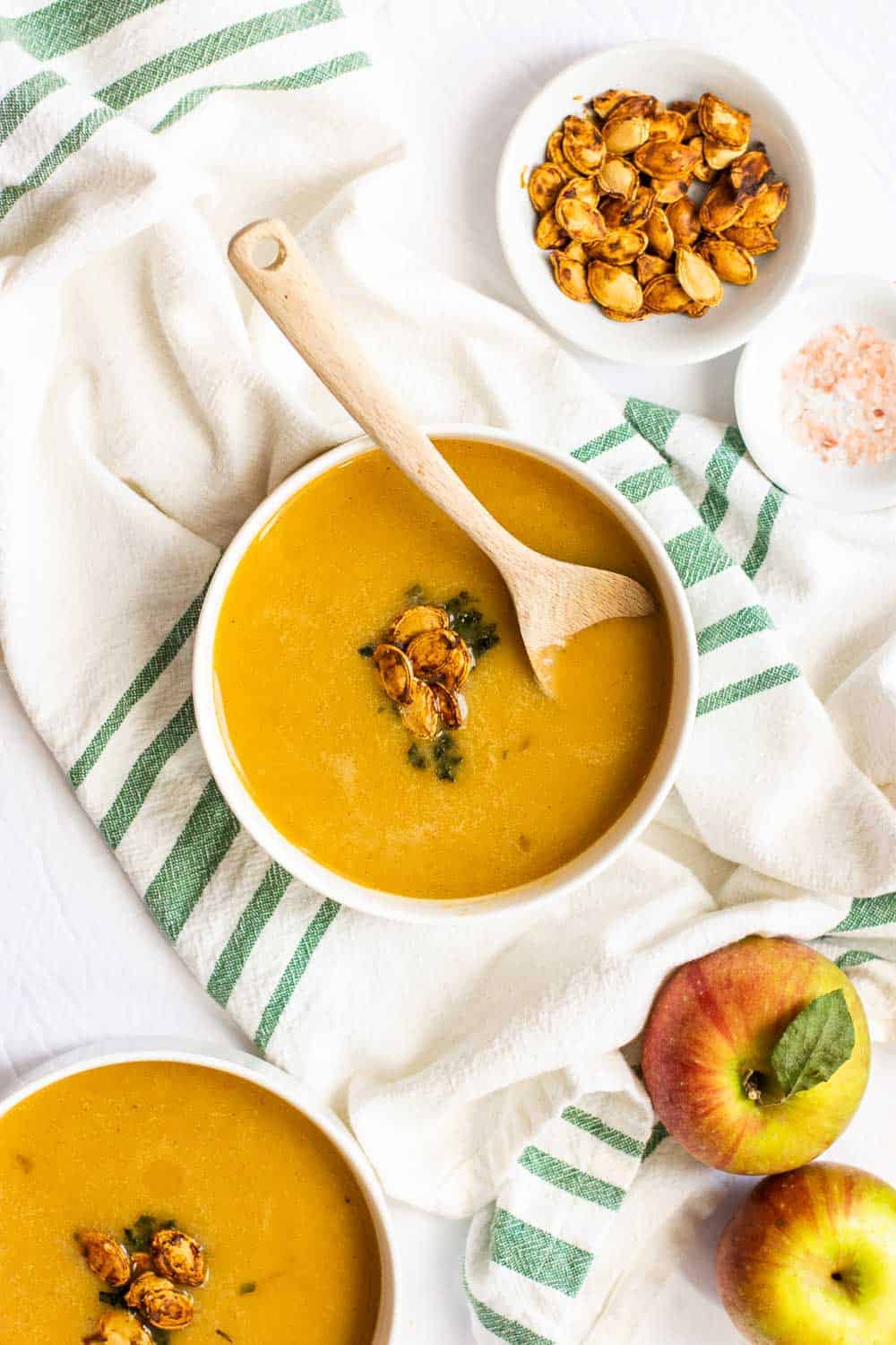 This creamy Vegan Butternut Squash Soup with Apple is perfect for a delicious light meal or an appetizer. Made with whole and seasonal ingredients. || The Butter Half #souprecipes #vegansoups #fallrecipes #realfoodrecipes #thebutterhalf