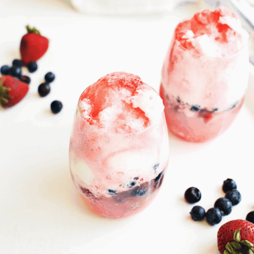 Red, White, and Blue 4th of July Ice Cream Floats | Berry Ice Cream Float Recipe | 4th of July recipe ideas | 4th of July dessert recipes | fourth of July desserts | fourth of July recipes | fun frozen recipes | ice cream float recipe ideas | homemade ice cream float recipes | how to make a homemade ice cream float | patriotic recipe ideas | fun recipes for kids | family friendly recipes || The Butter Half
