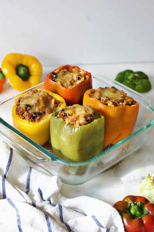 These Vegetarian Stuffed Peppers are full of protein that will leave you feeling full and satisfied! || The Butter Half #easydinner #vegetariandinnerrecipe #vegetarianrecipes #dinnerrecipes #thebutterhalf