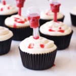 Vampire Bite Cupcakes with Edible Blood | easy halloween recipes, halloween dessert recipes, halloween treat recipes, halloween cupcake recipes, fun halloween recipes, vampire recipe ideas, spooky halloween treats, kid-friendly halloween treats, homemade halloween recipes || The Butter Half via @thebutterhalf
