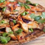 Thai Grilled Chicken Pizza | homemade pizza recipes, pizza recipe ideas, how to make a homemade pizza, thai inspired recipes, recipes using chicken, chicken pizza recipes, easy pizza recipes, family friendly recipes || The Butter Half via @thebutterhalf