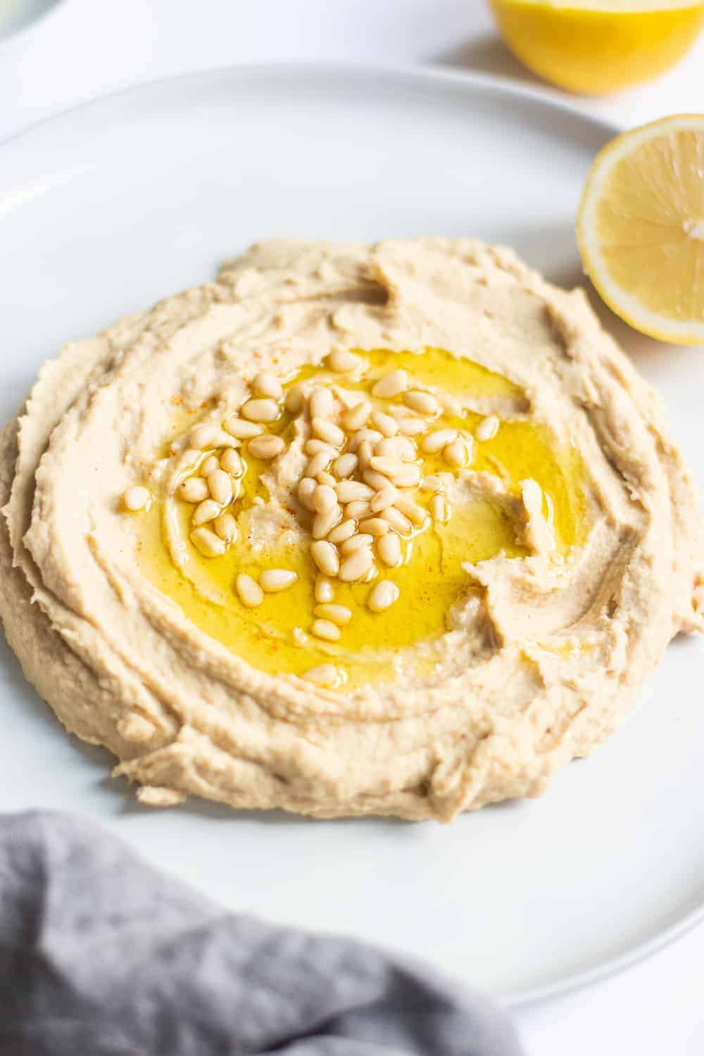 The best and easiest Instant Pot hummus with canned chickpeas! Taking only 20 minutes, gluten free, and vegan - it's an easy decision to make this recipe! || The Butter Half #hummus #instantpotrecipes #instantpothummus 