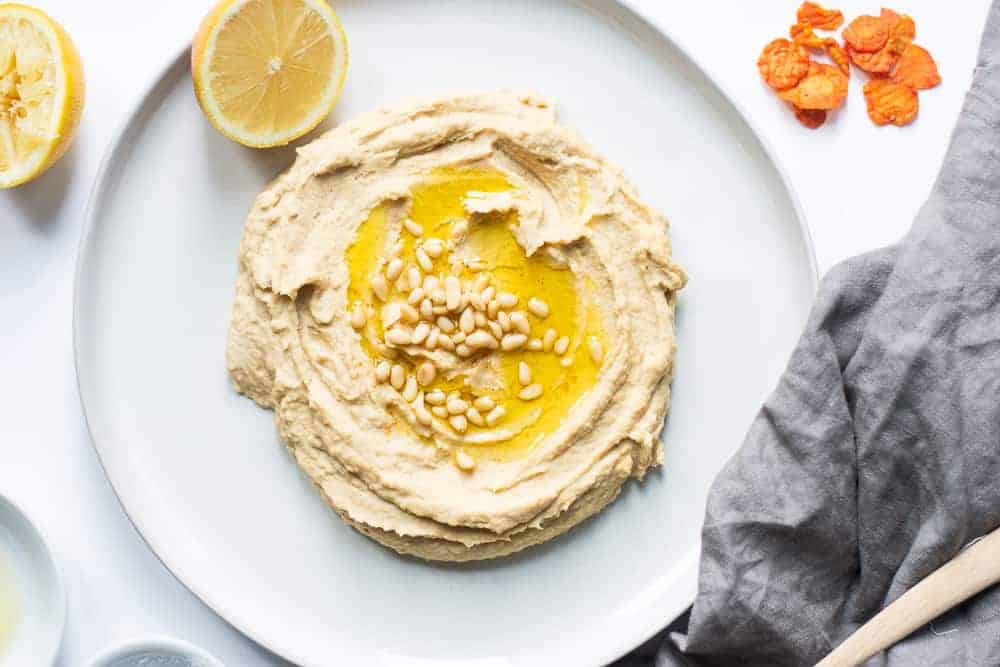 The best and easiest Instant Pot hummus with canned chickpeas! Taking only 20 minutes, gluten free, and vegan - it's an easy decision to make this recipe! || The Butter Half #hummus #instantpotrecipes #instantpothummus 