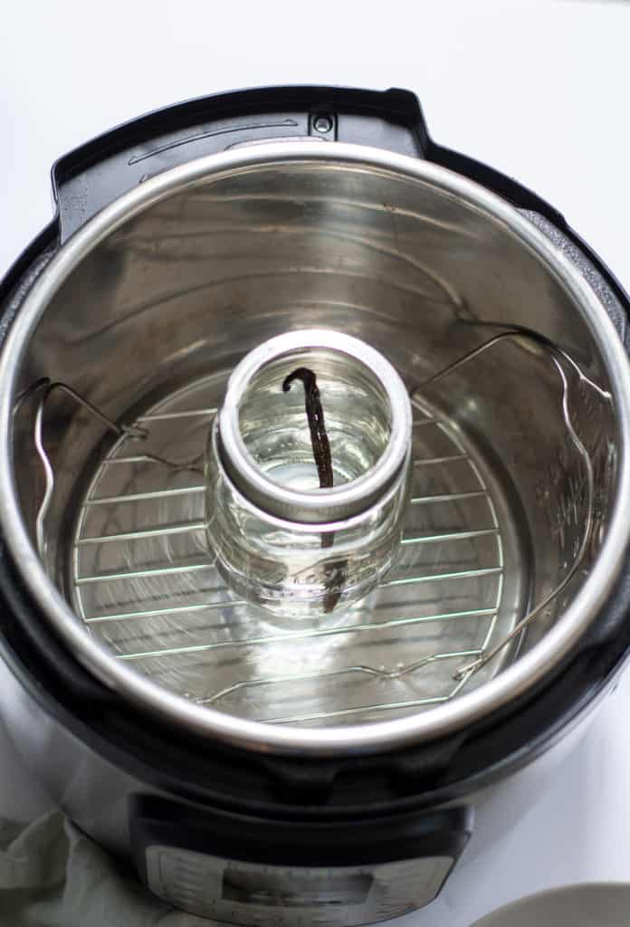 Making homemade vanilla extract in your Instant Pot will you time and money. Making it from scratch is more cost effective than buying it and using your Instant Pot cuts out the long extraction time.  || The Butter Half #vanillaextract #instantpot #homemadeextract