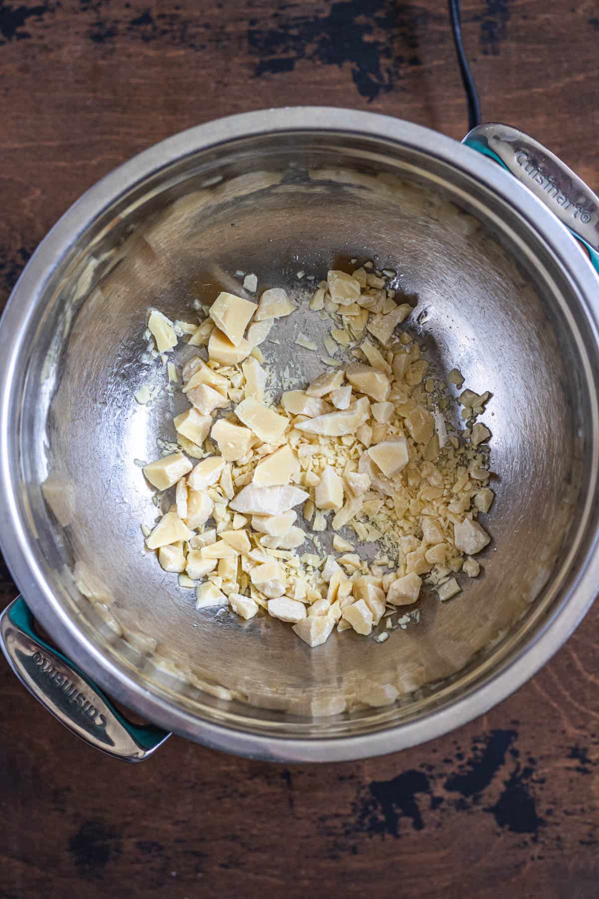 cacao butter, chopped into even pieces in a metal bowl