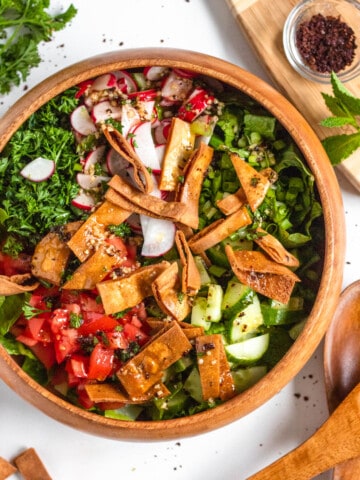 Lebanese fattoush salad in a bowl with a light colored background