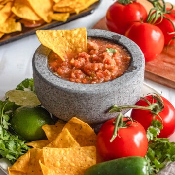 salsa roja in a small serving bowl with a light colored background