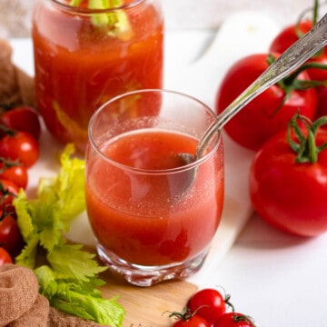 homemade tomato juice with a light colored background