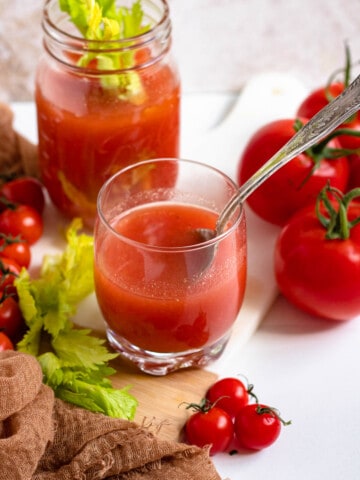 homemade tomato juice with a light colored background
