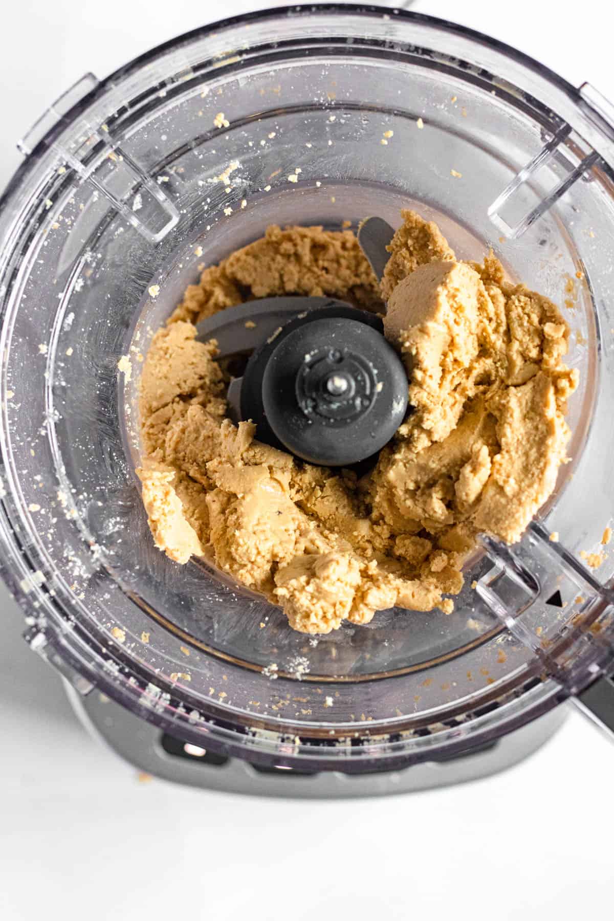 cashew butter in a food processor forming a spread