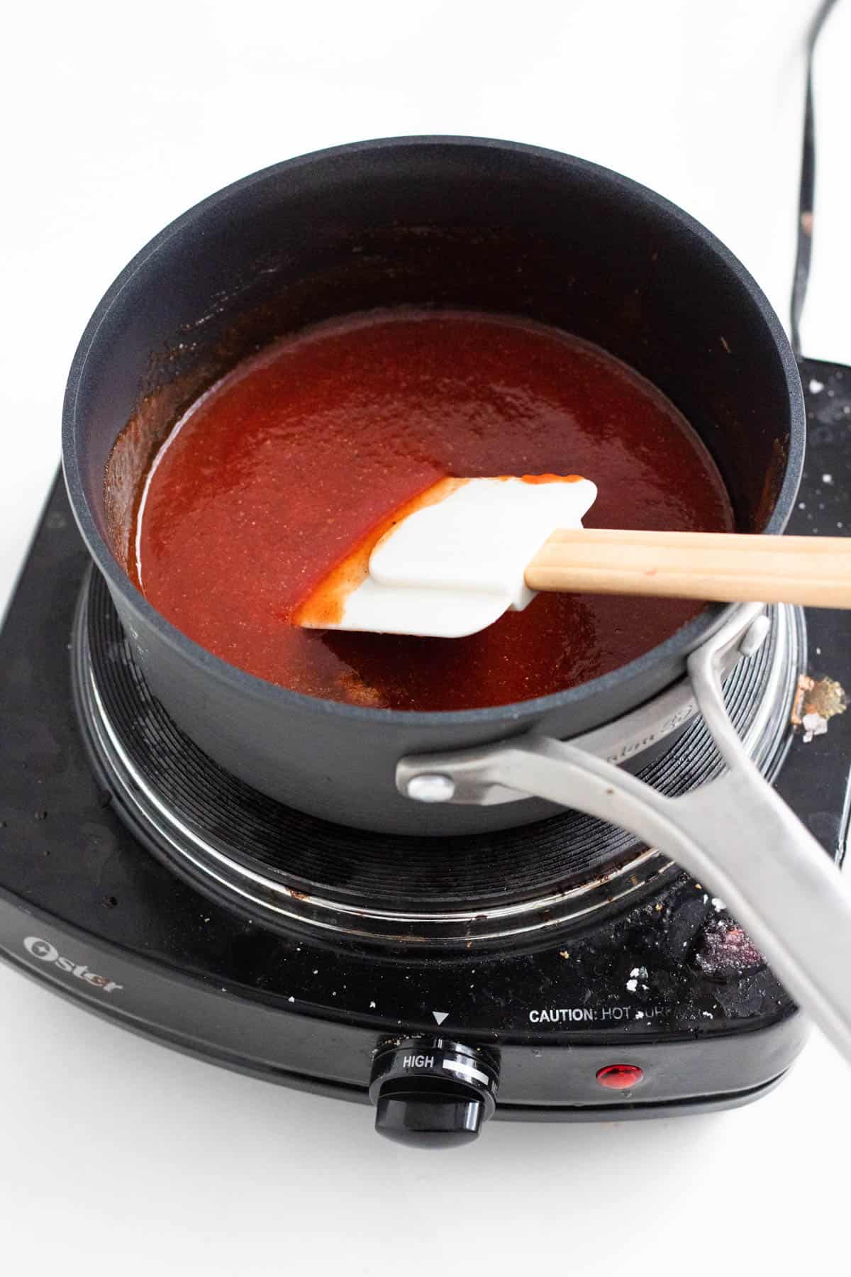 chili sauce ingredients in a small pot ready to simmer