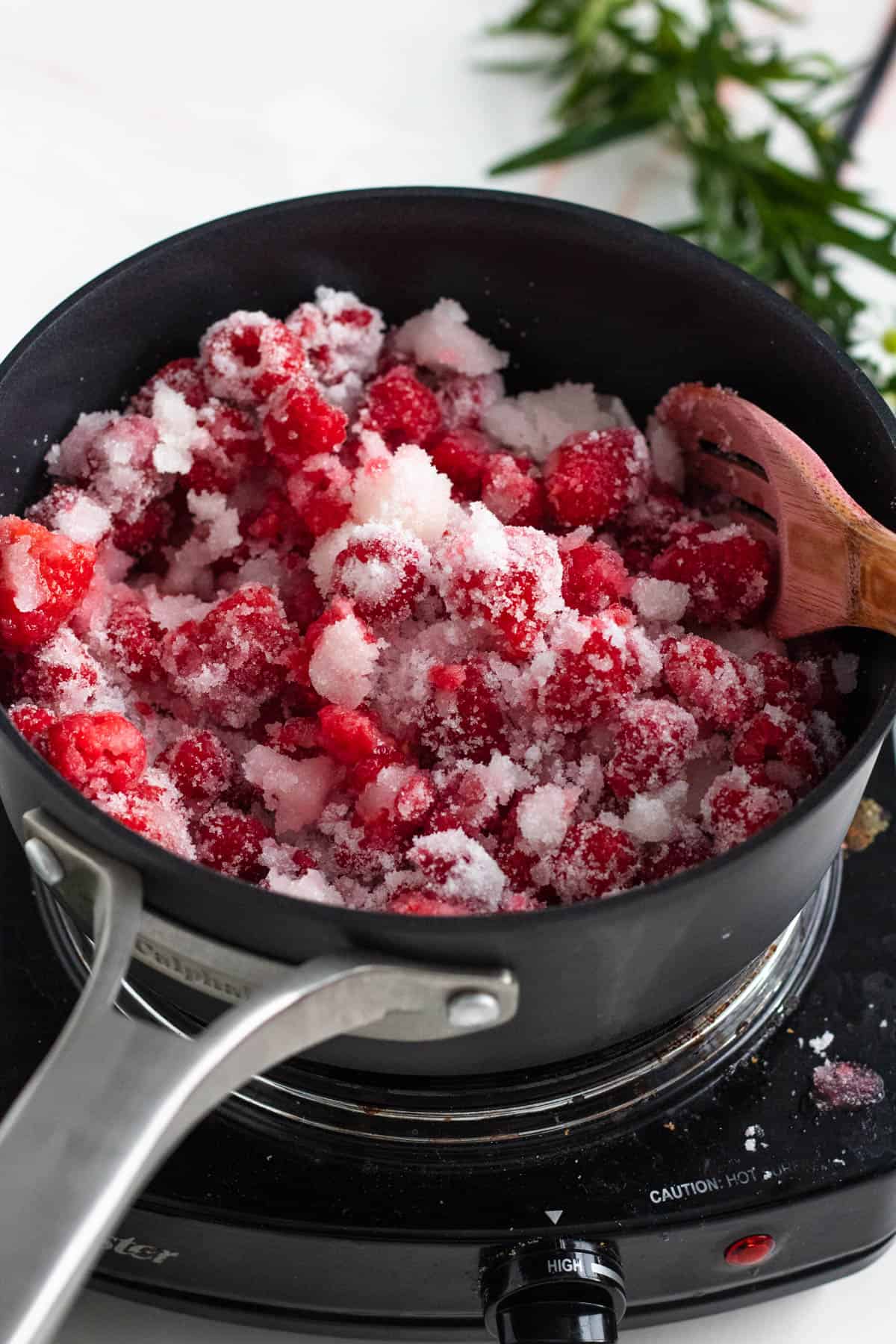 raspberries, sugar, and lemon juice in a medium-sized pot mixed together